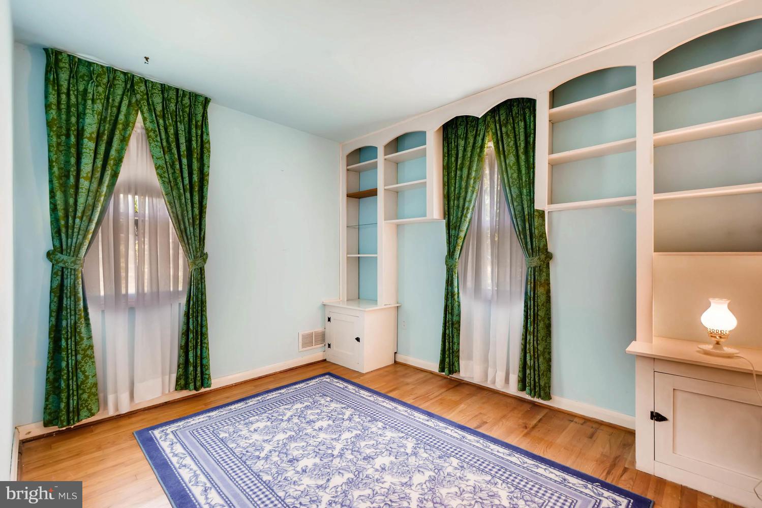 1018 St Albans Road Baltimore, MD 21239 - Photo 17 of 28 a view of room with window and wooden floor