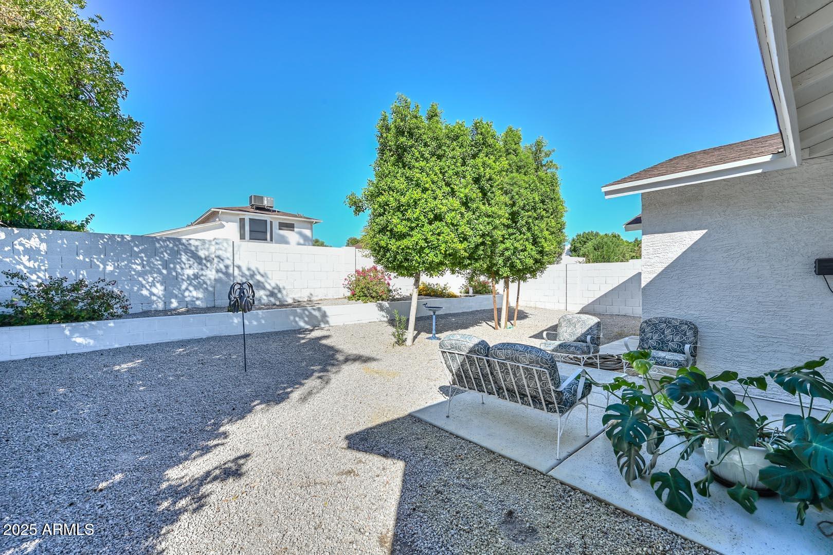 606 West Grandview Road Phoenix, AZ 85023 - Photo 30 of 33 a view of yard and patio