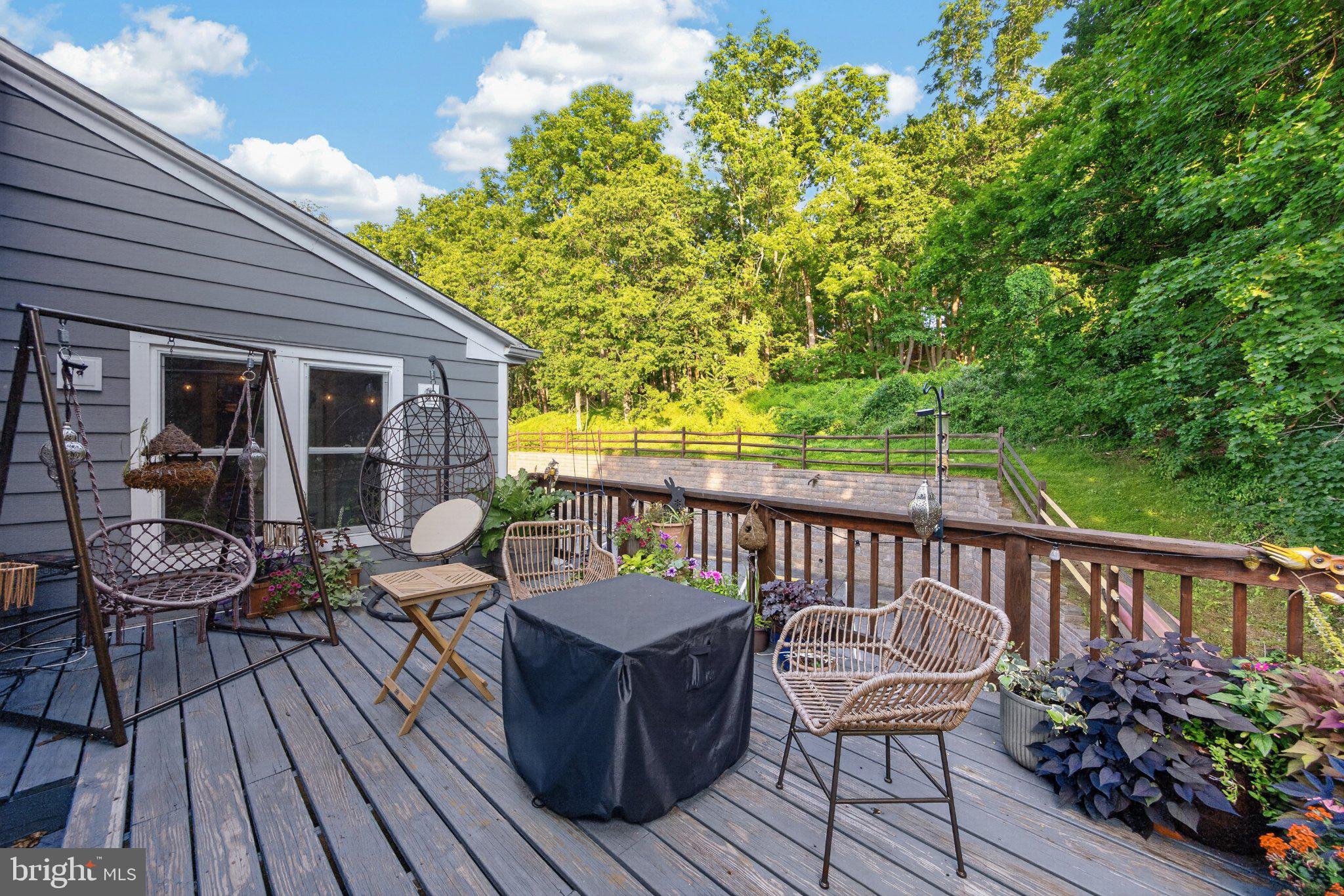 1214 Kimberton Road Chester Springs, PA 19425 - Photo 6 of 53 Serene deck with lush green backdrop.