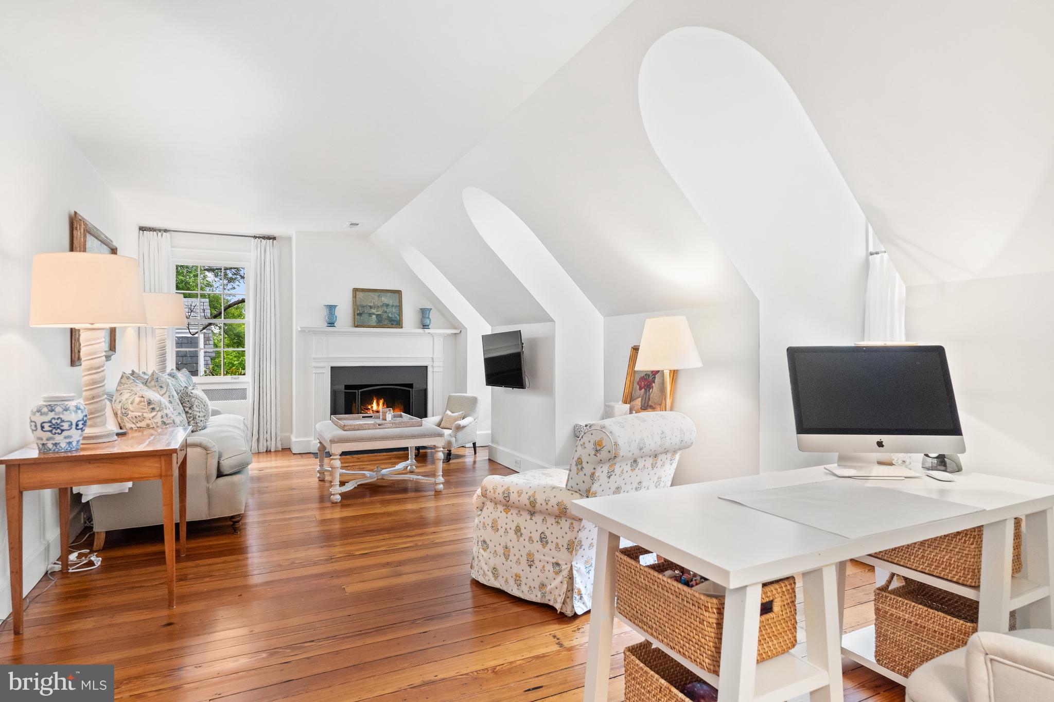 1671 31st Street Northwest Washington, DC 20007 - Photo 15 of 27 a living room with furniture and a flat screen tv