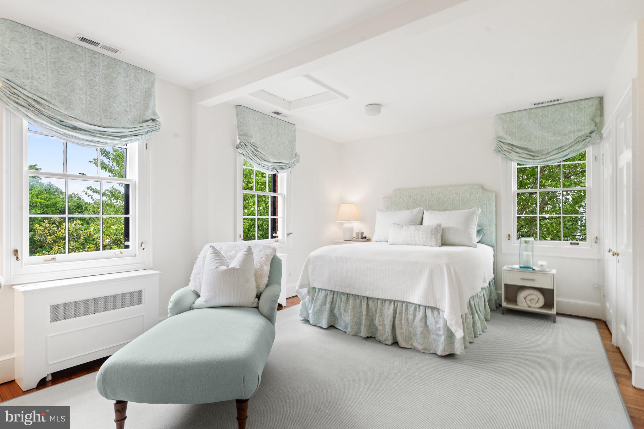 1671 31st Street Northwest Washington, DC 20007 - Photo 18 of 27 a bedroom with a bed and a couch