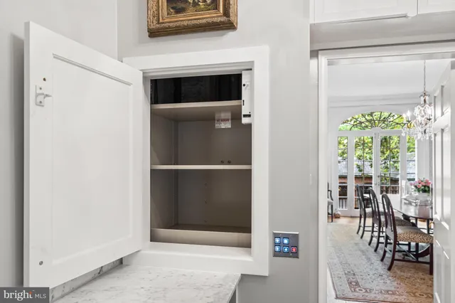 a bedroom with a bed and a fireplace