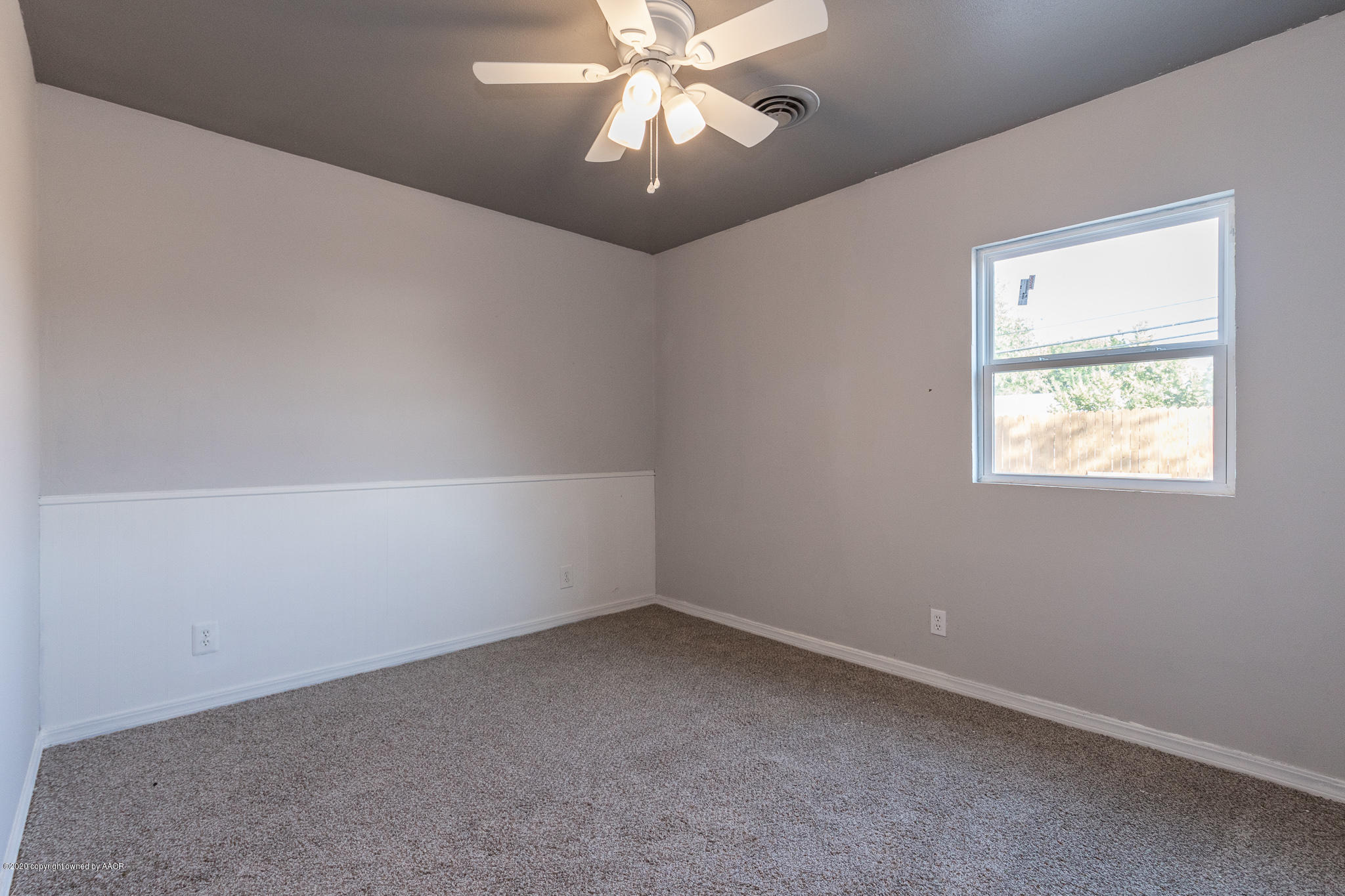 4715 South Lamar Street Amarillo, TX 79110 - Photo 17 of 28 Downstairs Bedroom three 1