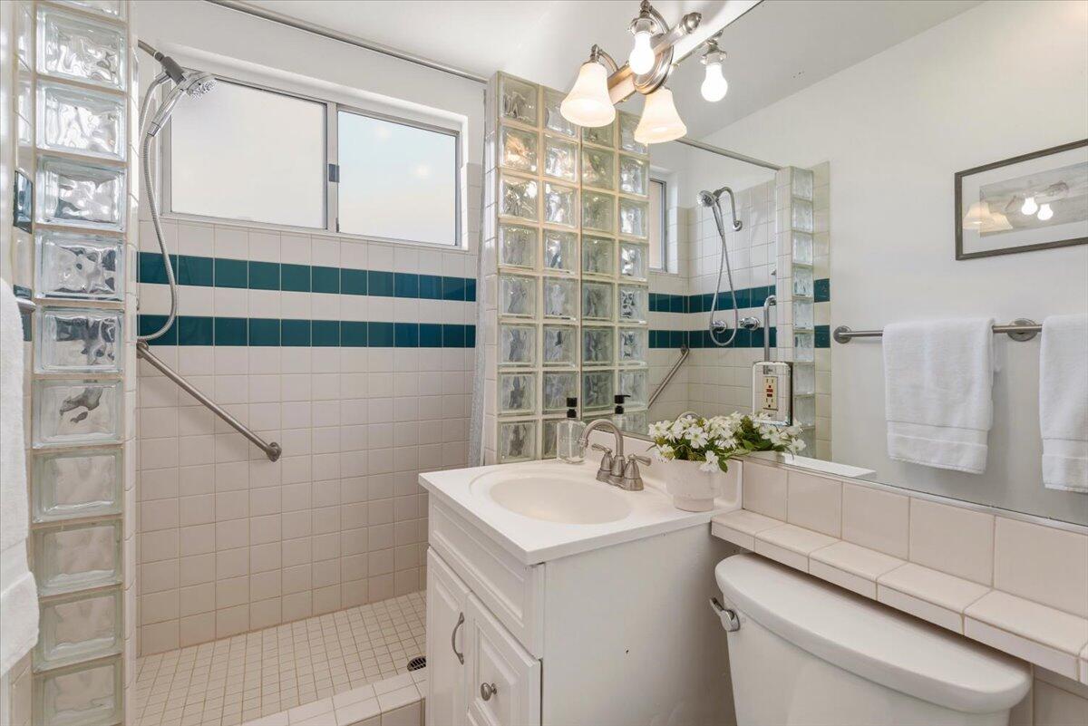 6231 Aberdeen Avenue Goleta, CA 93117 - Photo 10 of 15 a bathroom with a sink a toilet and shower