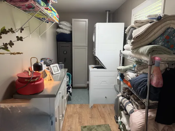 a bedroom with a bed and a fireplace