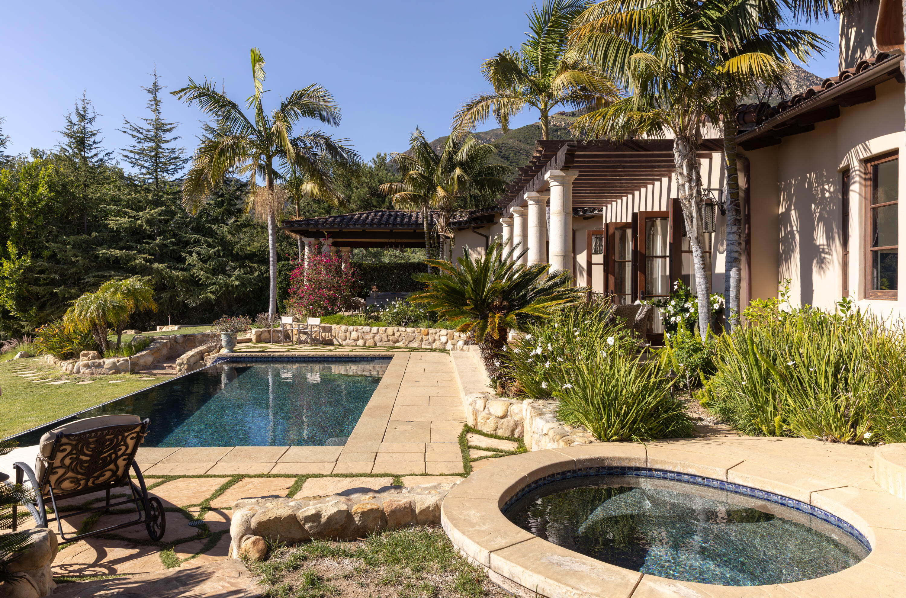 3091 Hidden Valley Lane Montecito, CA 93108 - Photo 24 of 62 a view of a swimming pool with a patio
