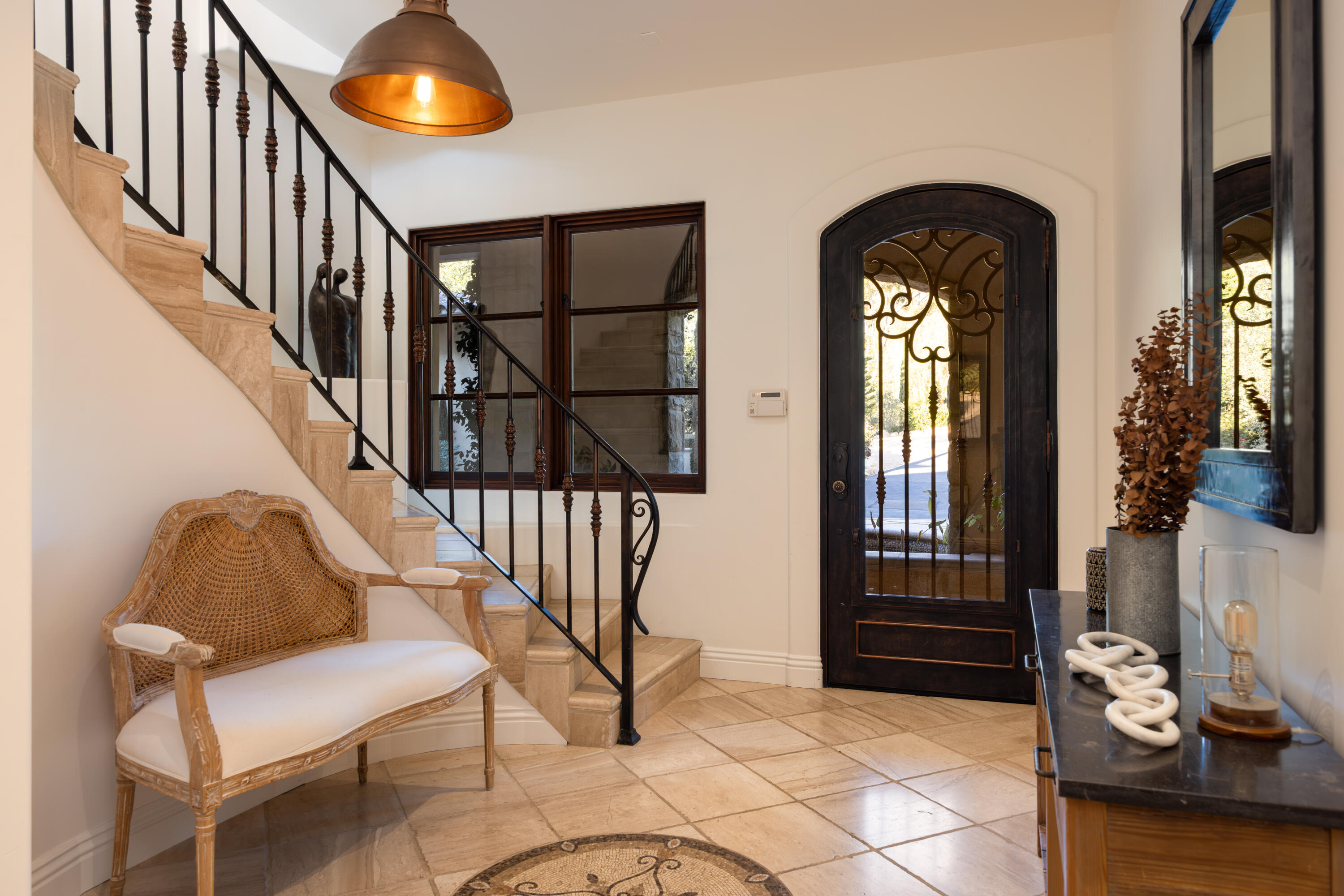 3091 Hidden Valley Lane Montecito, CA 93108 - Photo 26 of 62 a view of front door with dining room and stairs