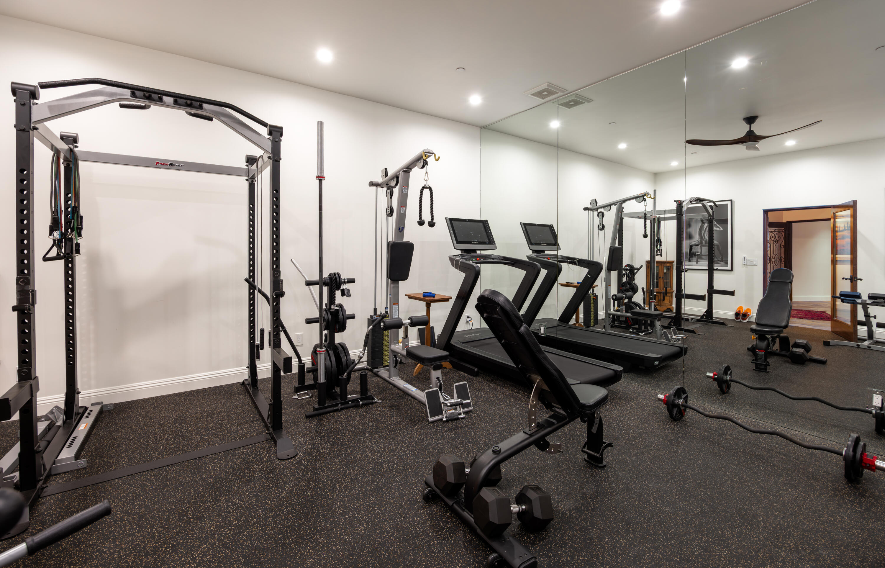 3091 Hidden Valley Lane Montecito, CA 93108 - Photo 30 of 62 a view of a room with gym equipment