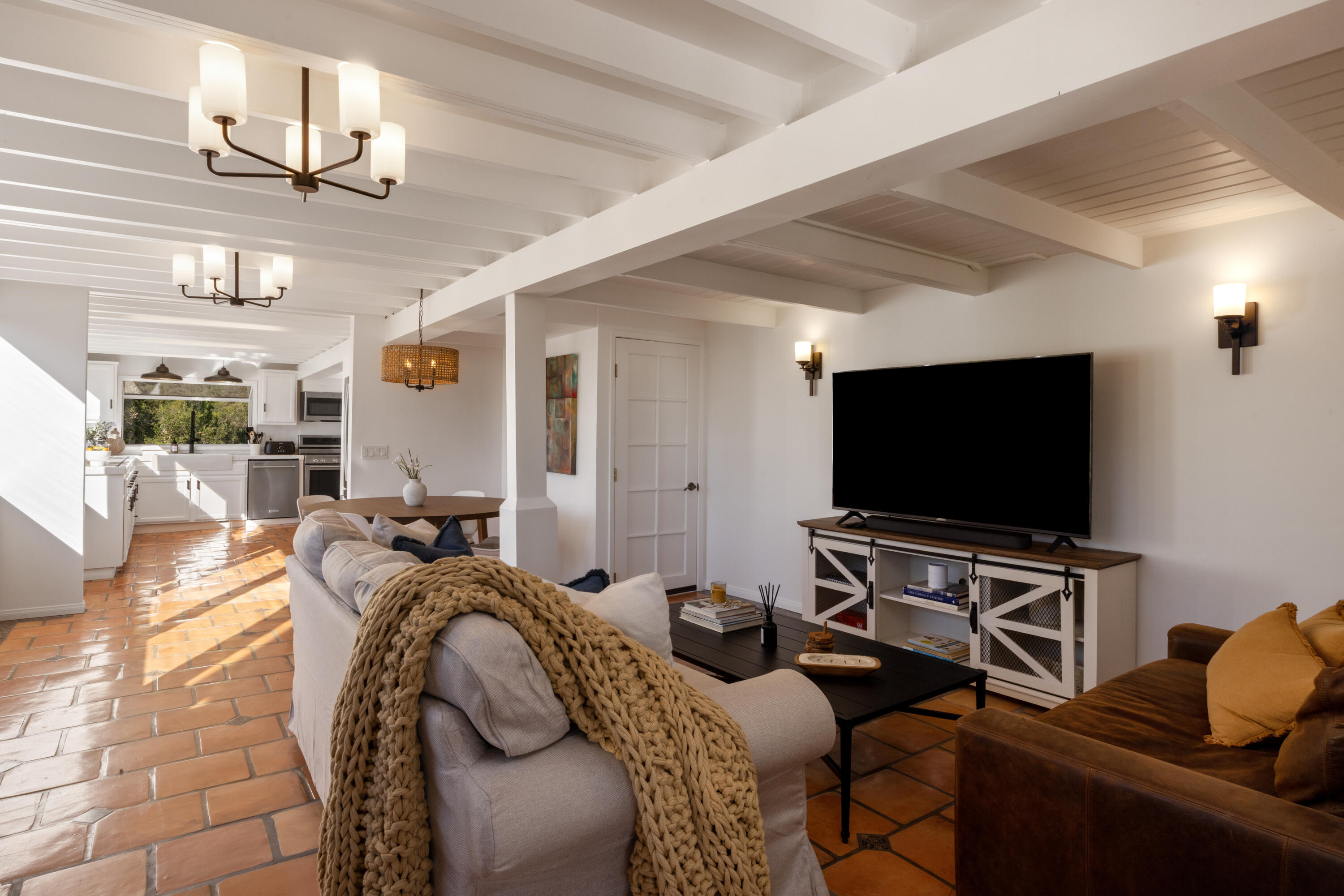 3091 Hidden Valley Lane Montecito, CA 93108 - Photo 40 of 62 a living room with furniture and a flat screen tv