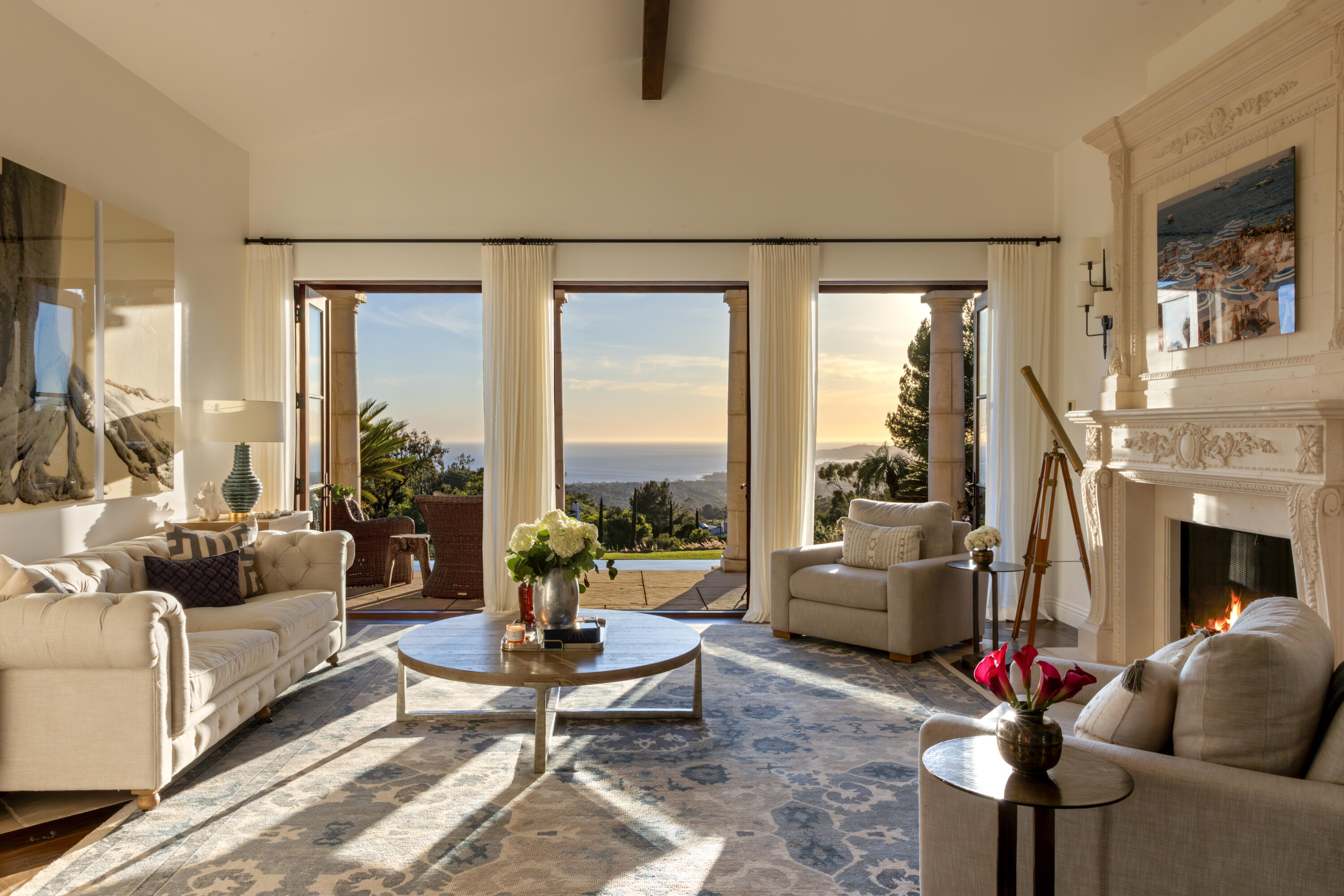 3091 Hidden Valley Lane Montecito, CA 93108 - Photo 5 of 62 a living room with furniture fireplace and a large window