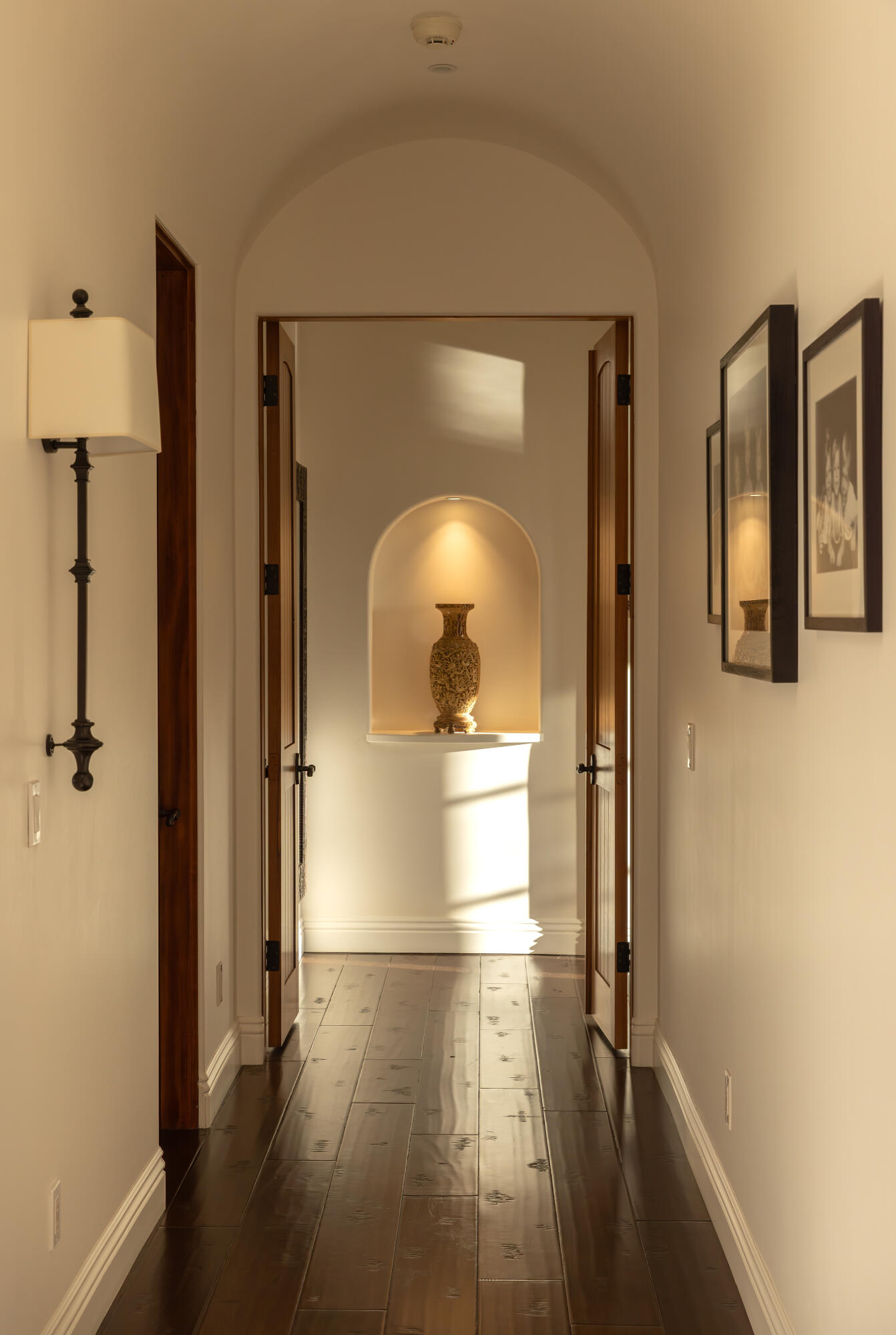 3091 Hidden Valley Lane Montecito, CA 93108 - Photo 8 of 62 a view of a hallway with wooden floor windows and a bathroom