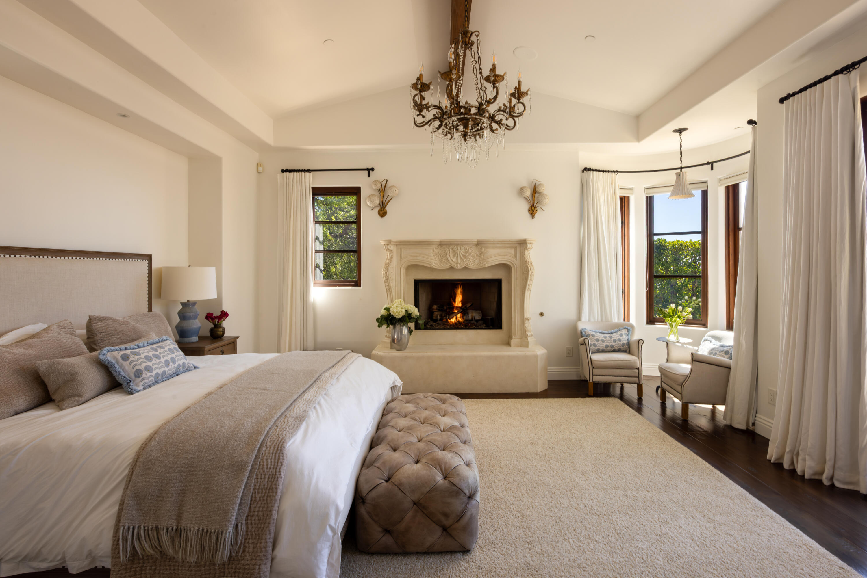 3091 Hidden Valley Lane Montecito, CA 93108 - Photo 9 of 62 a bedroom with a bed and a fireplace