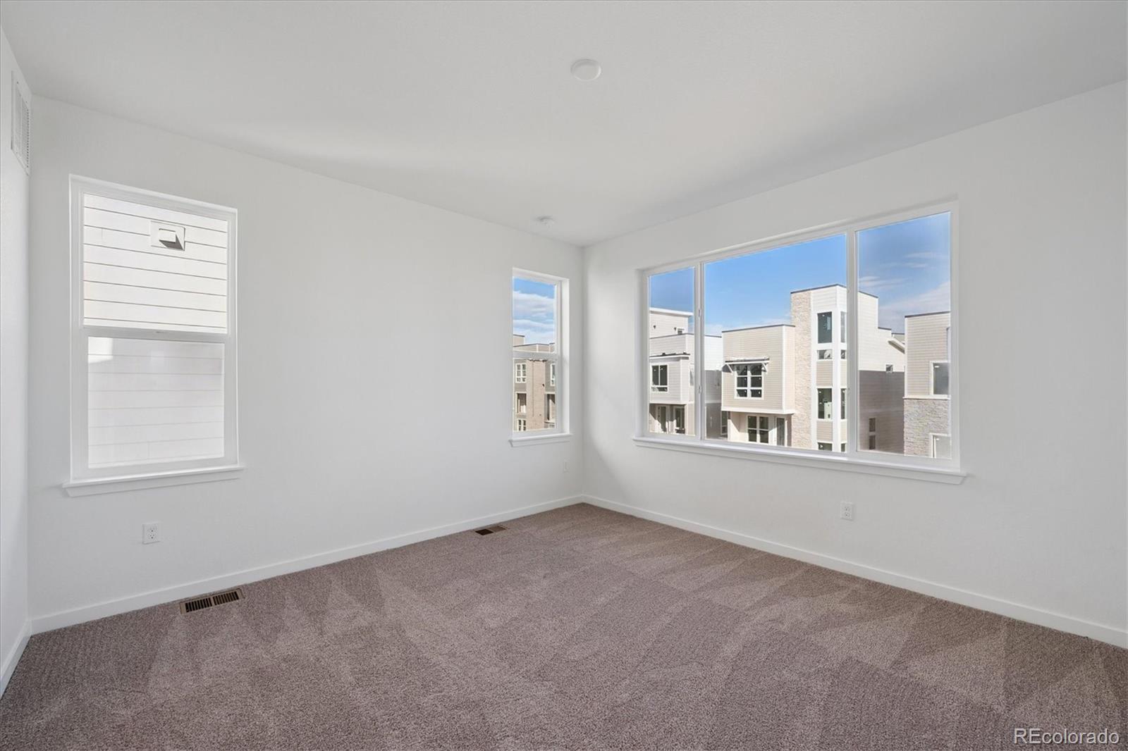 1227 Rhett Drive Erie, CO 80026 - Photo 14 of 24 a view of an empty room with a window