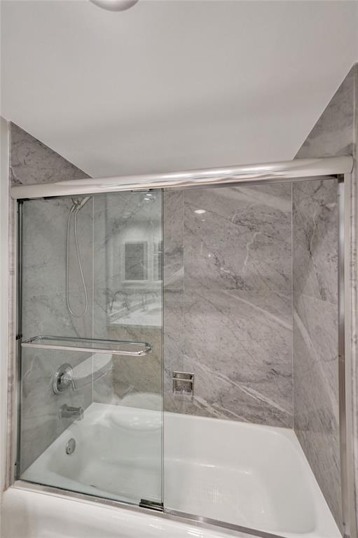 936 Intracoastal Drive, Unit 12C Fort Lauderdale, FL 33304 - Photo 19 of 65 a bathroom with a shower and a bath tub