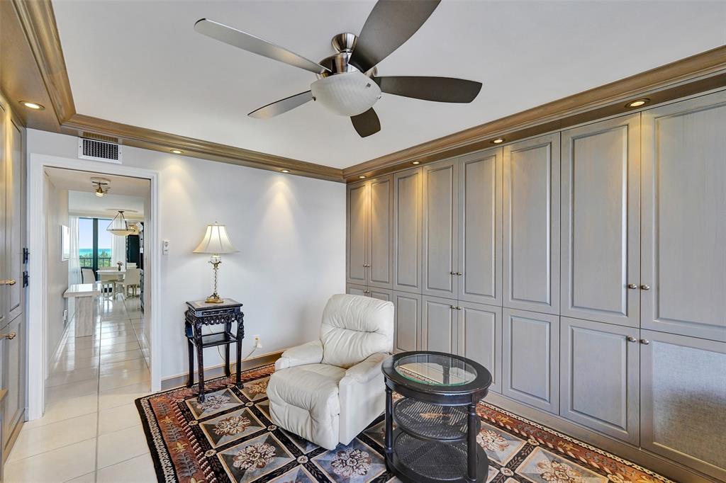 936 Intracoastal Drive, Unit 12C Fort Lauderdale, FL 33304 - Photo 24 of 65 a living room with furniture and a rug