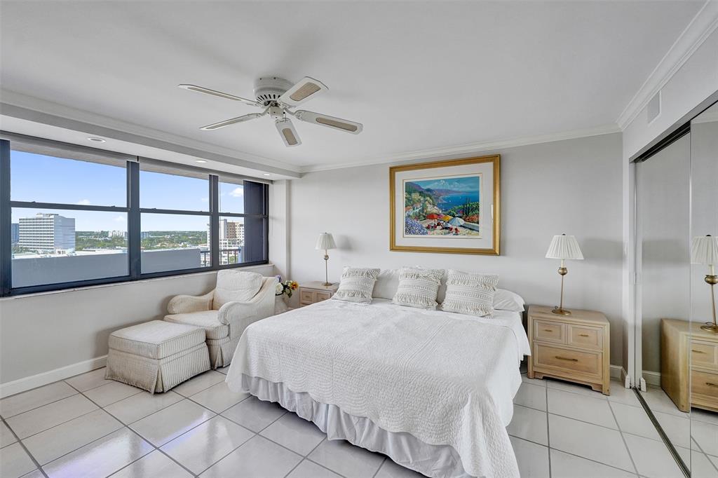 936 Intracoastal Drive, Unit 12C Fort Lauderdale, FL 33304 - Photo 27 of 65 a spacious bedroom with two beds and a large window