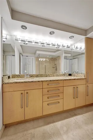 a kitchen that has a sink and a stove