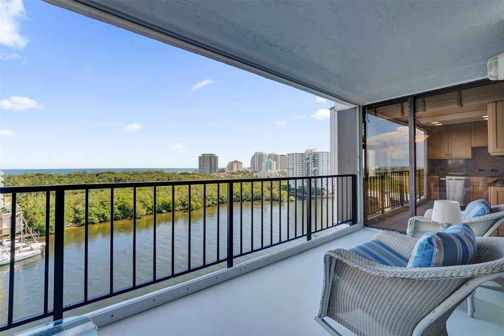 936 Intracoastal Drive, Unit 12C Fort Lauderdale, FL 33304 - Photo 48 of 65 a living room with furniture and a large window