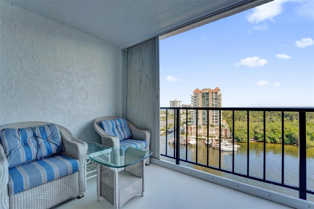 936 Intracoastal Drive, Unit 12C Fort Lauderdale, FL 33304 - Photo 49 of 65 a balcony with furniture and a potted plant