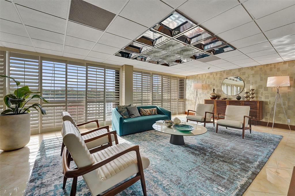 936 Intracoastal Drive, Unit 12C Fort Lauderdale, FL 33304 - Photo 57 of 65 a living room with furniture and a large window