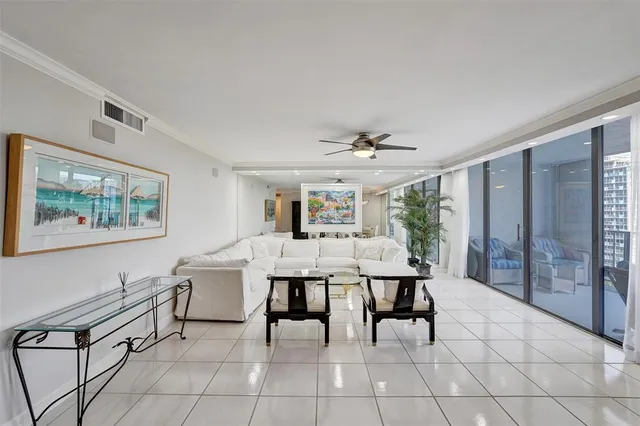 a view of a livingroom with furniture and window