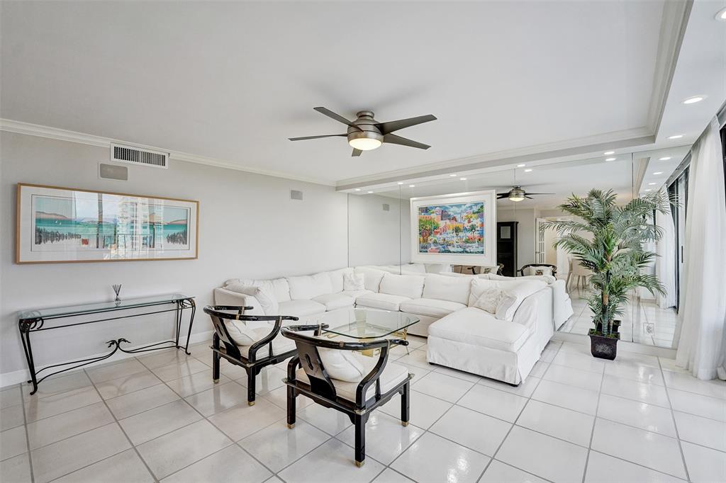 936 Intracoastal Drive, Unit 12C Fort Lauderdale, FL 33304 - Photo 9 of 65 a living room with furniture and a ceiling fan