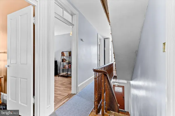 a bedroom with bed and a window