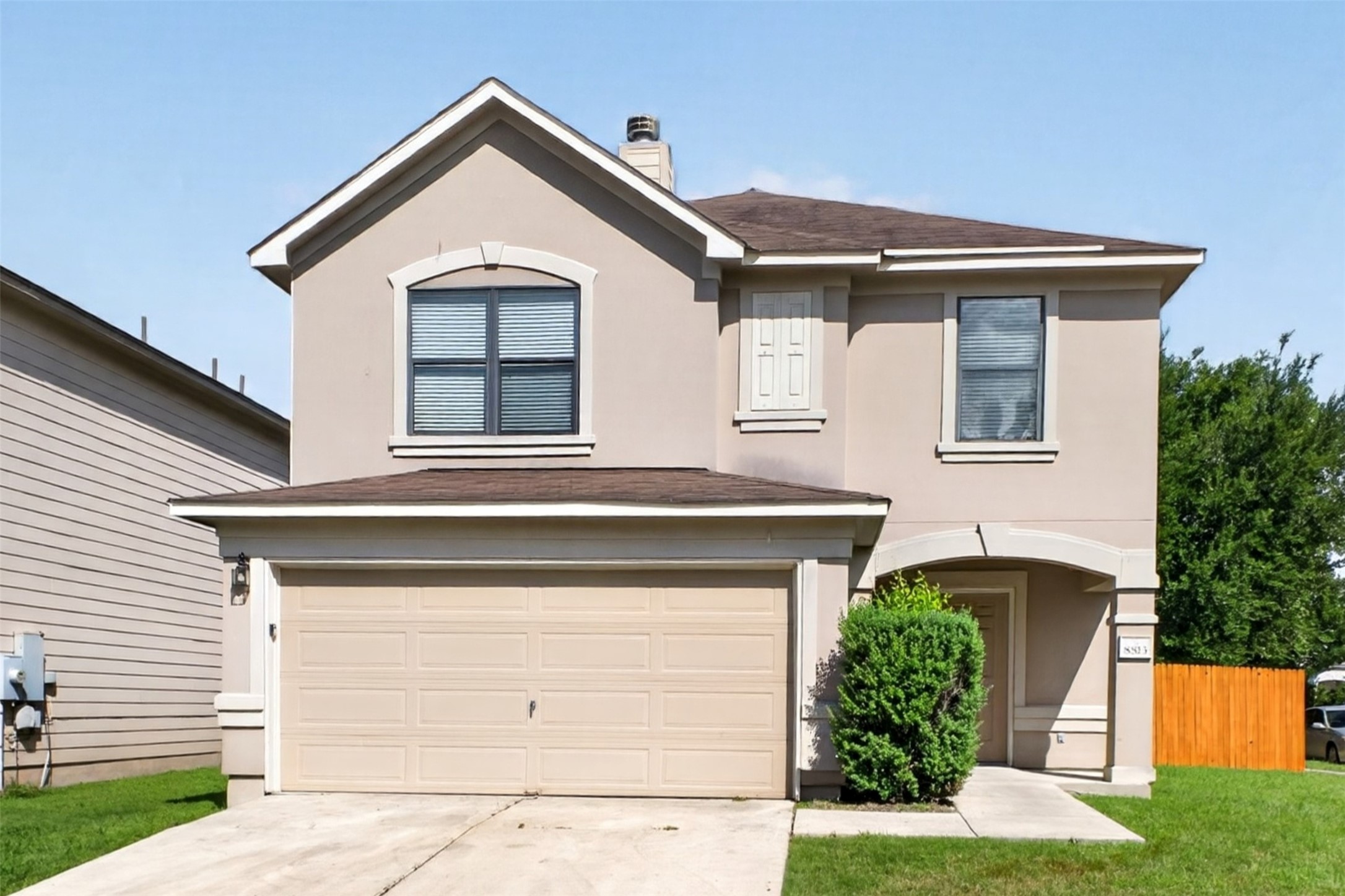 8813 Wiley Way Austin, TX 78747 - Photo 1 of 1 A charming stucco facade welcomes you to this inviting two-story home, complete with an integrated garage.