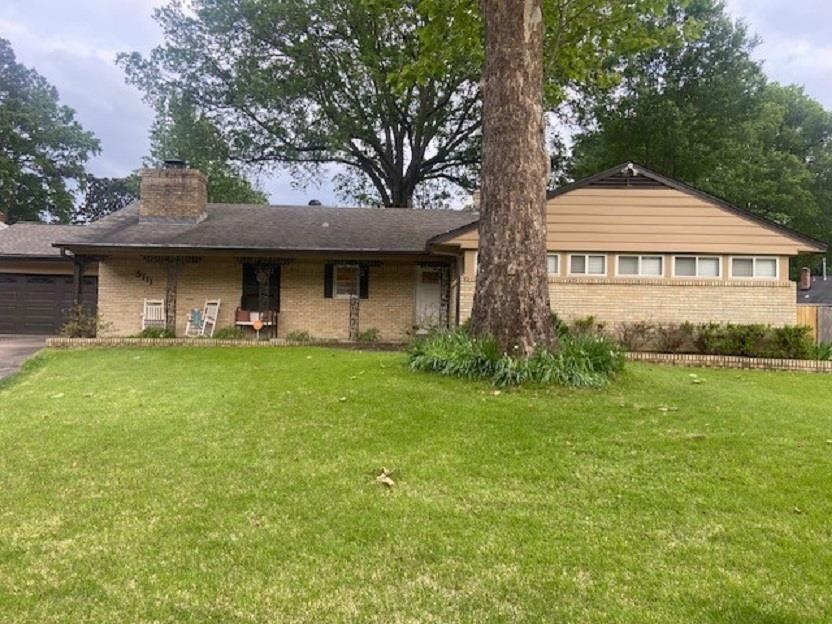 5111 Mason Road Memphis, TN 38117 - Photo 2 of 23 a front view of a house with garden