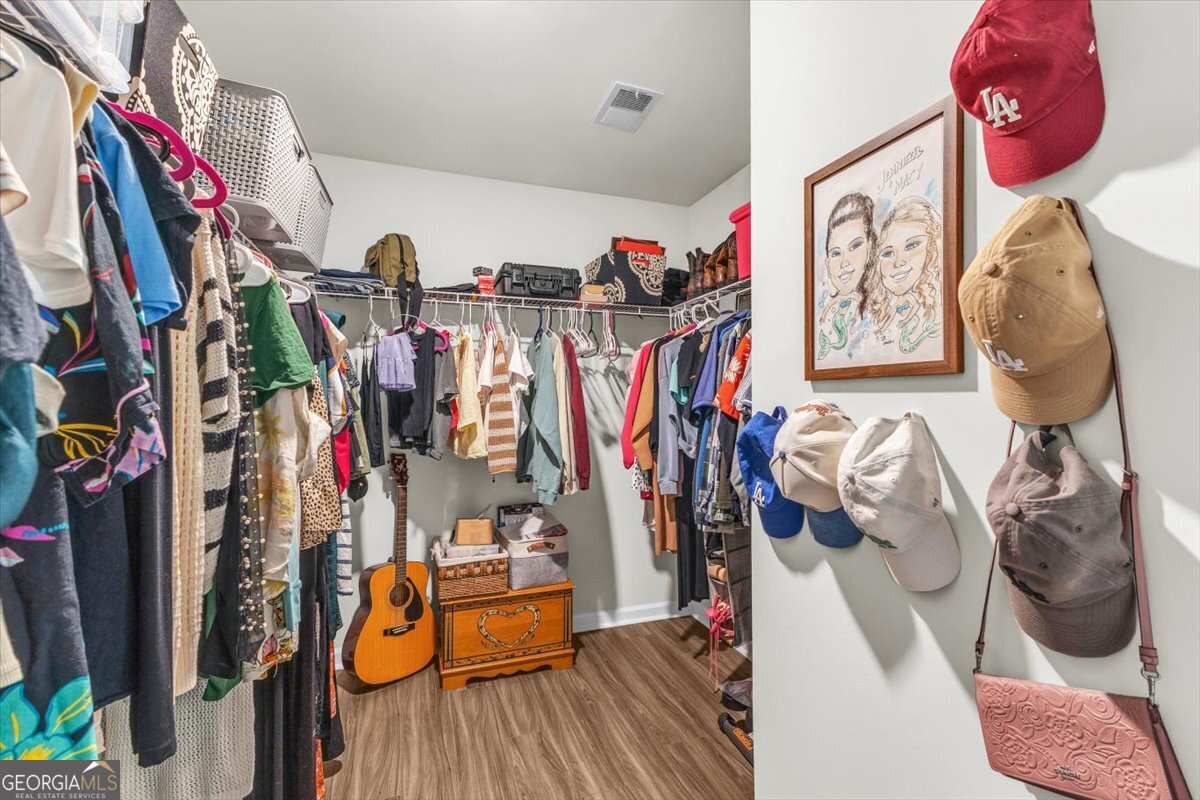 590 Wilkins Road Midway, GA 31320 - Photo 39 of 62 a view of a closet with storage