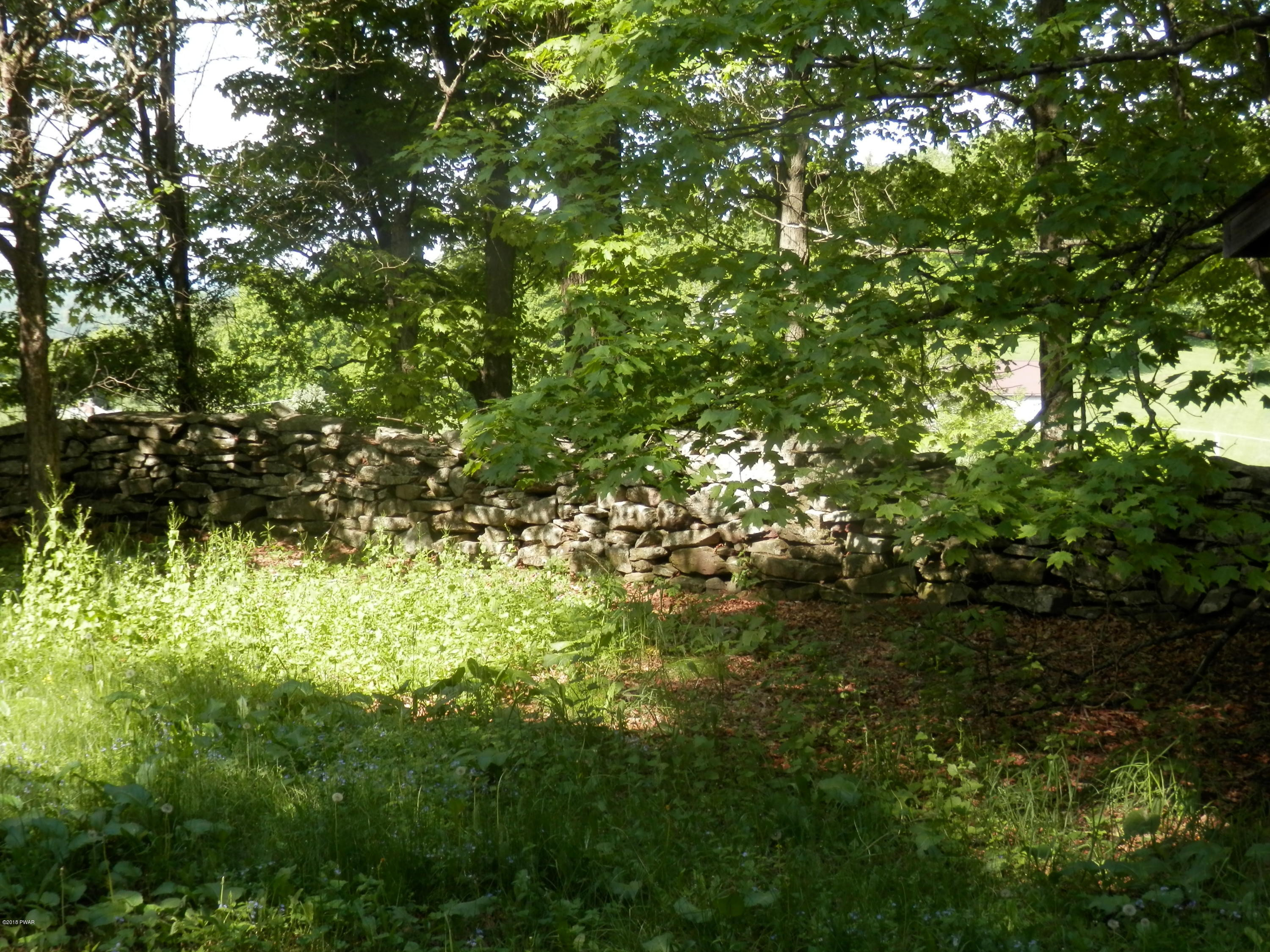 16 Floral Ridge Run Milanville, PA 18443 - Photo 22 of 26 BEAUTIFUL ROCK WALLS