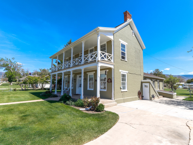 155 West Center Street Fillmore, UT 84631 - Photo 6 of 86 Two-story residence featuring a dual-level covered porch with decorative railings