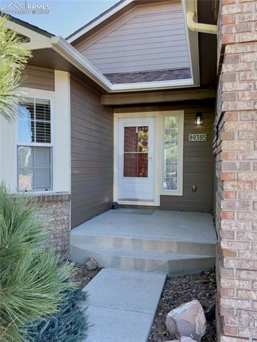 9385 Winged Foot Road Peyton, CO 80831 - Photo 3 of 50 Secluded Doorway to the home