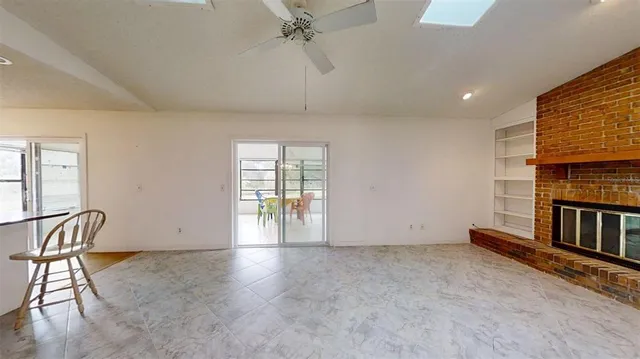 a bed room with a bed furniture and a ceiling fan