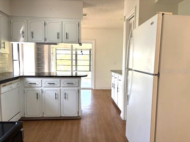 53 North Archwood Drive Inverness, FL 34450 - Photo 35 of 81 a kitchen with stainless steel appliances granite countertop a refrigerator and a stove