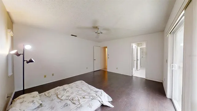 a view of a large garden with large trees