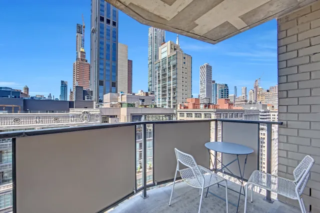 a dining area with chairs and table