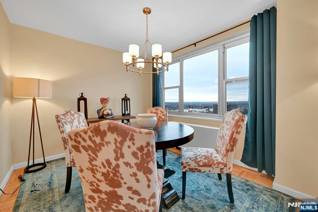 2000 Linwood Avenue, Unit 18B Fort Lee, NJ 07024 - Photo 7 of 27 a view of a dining room with furniture window and outside view