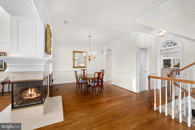 a view of a livingroom with furniture and a fireplace