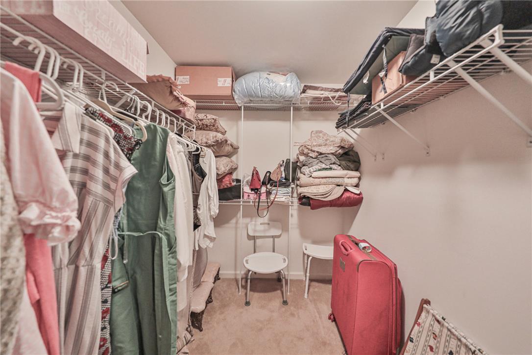 138 Clover Hollow Road Easton, PA 18045 - Photo 45 of 95 Well-appointed walk-in closet offers extensive storage solutions with wire shelving.
