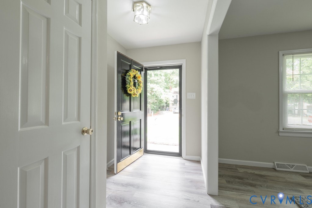 6901 Manning Road Chesterfield, VA 23832 - Photo 22 of 57 Entryway featuring a paneled black front door, a l