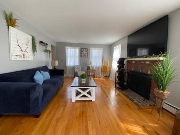 510 Wheelwright Road Barre, MA 01005 - Photo 6 of 37 a living room with furniture and a flat screen tv