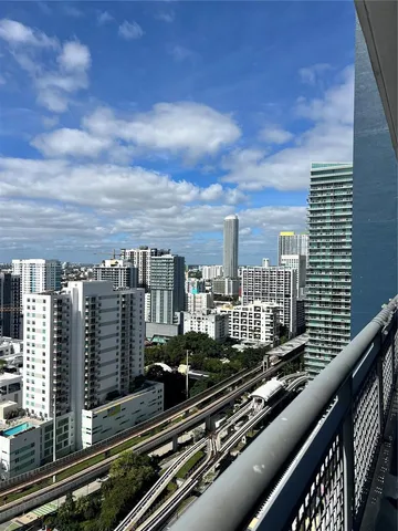 a view of a balcony with city view