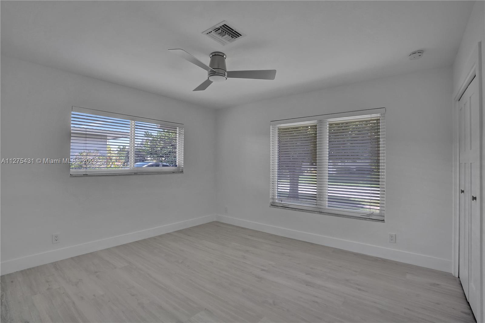 1311 Mulberry Way Boca Raton, FL 33486 - Photo 25 of 45 a view of an empty room with a window