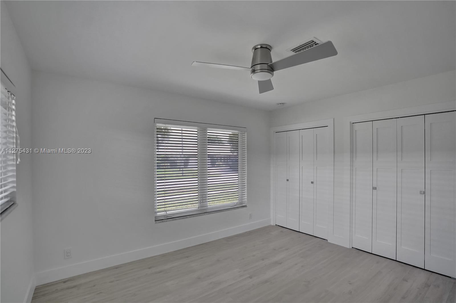 1311 Mulberry Way Boca Raton, FL 33486 - Photo 27 of 45 a view of an empty room with a window