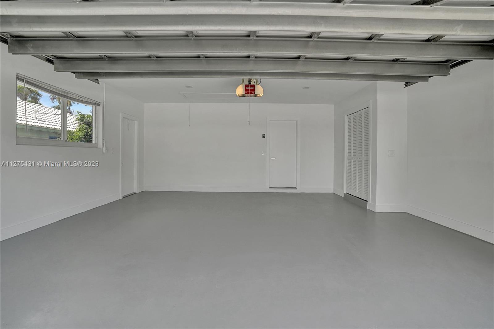 1311 Mulberry Way Boca Raton, FL 33486 - Photo 34 of 45 a utility room with washing machine