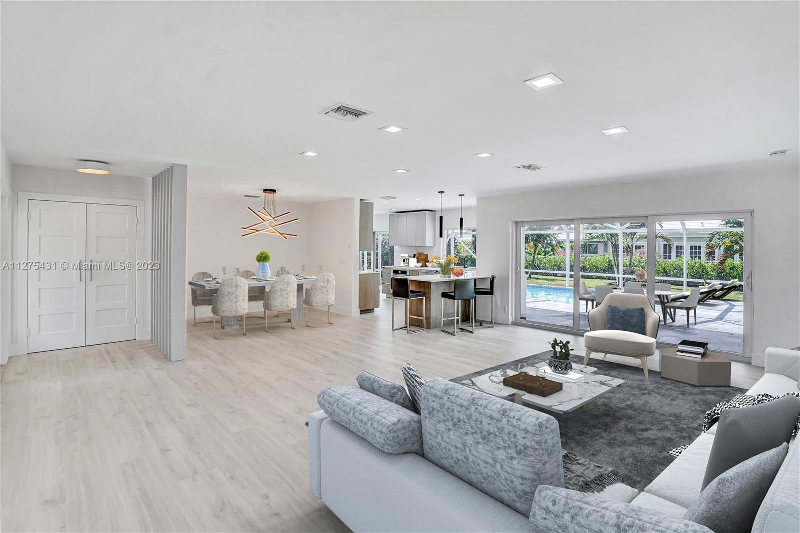 1311 Mulberry Way Boca Raton, FL 33486 - Photo 6 of 45 a living room with furniture and a large window