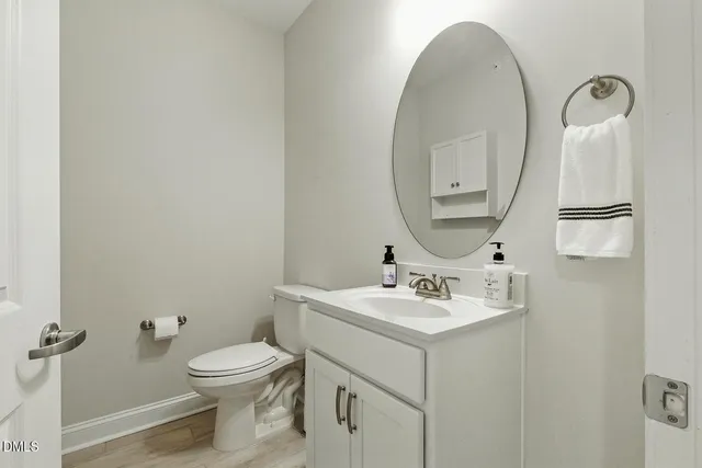 a view of a brick house with many windows