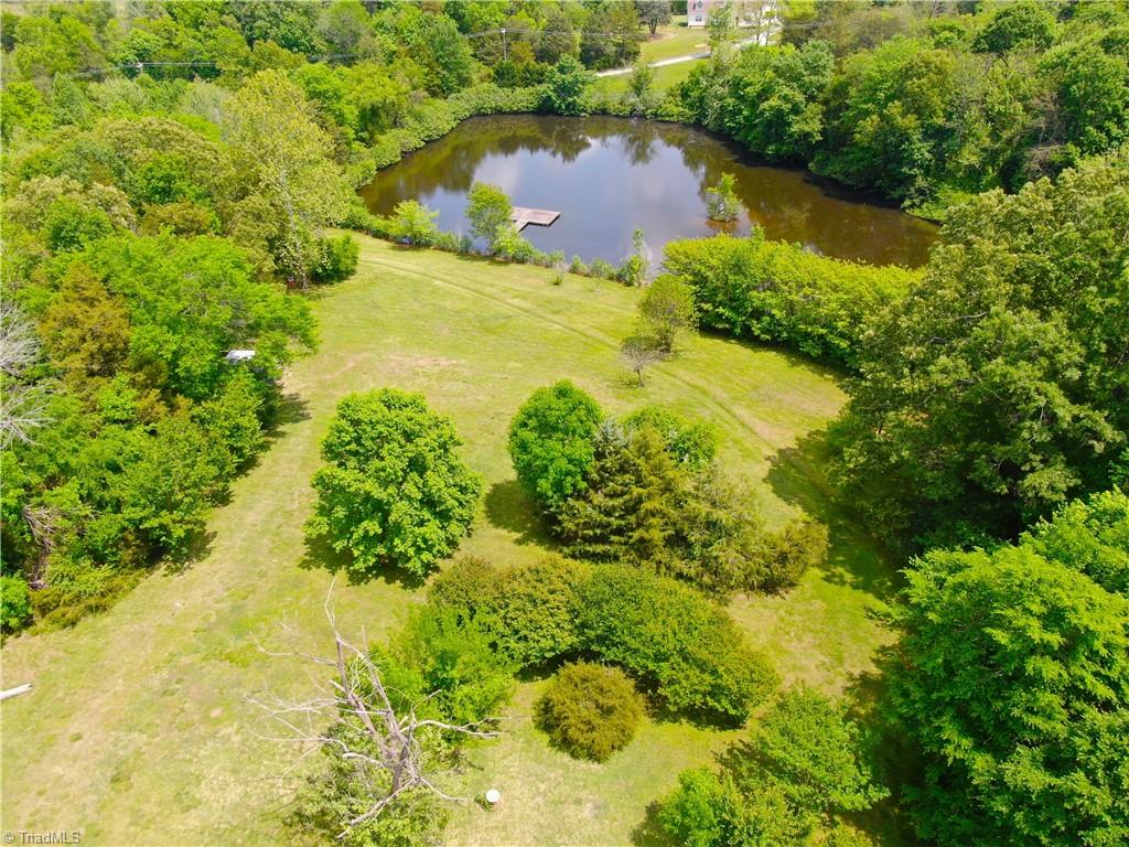 1336 A Townbranch Road Graham, NC 27253 - Photo 5 of 36 Spring fed pond brings life and beauty to the lot