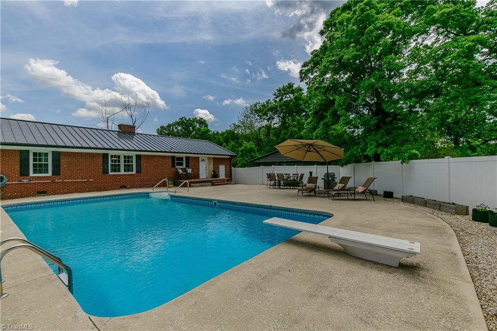1336 A Townbranch Road Graham, NC 27253 - Photo 6 of 36 Fabulous 40'x20' pool deck provides the feel of a resort in your own backyard!